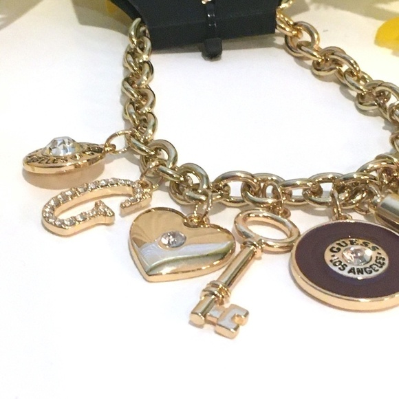 𝅺3/$29! GUESS Charm Bracelet Heart, Key, Tassel - Picture 2 of 9